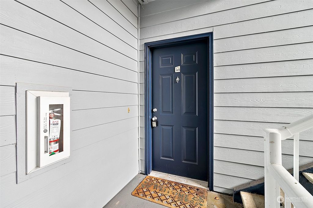 Photo of 10825 SE 200th Street #F203, Kent, WA 98031 (MLS # 2194078)