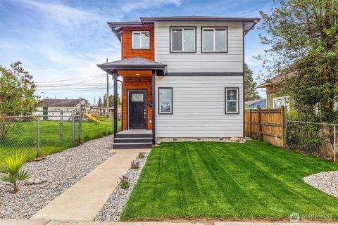 Photo of 934 E 61st ST, Tacoma, WA 98408 (MLS # 2516171)