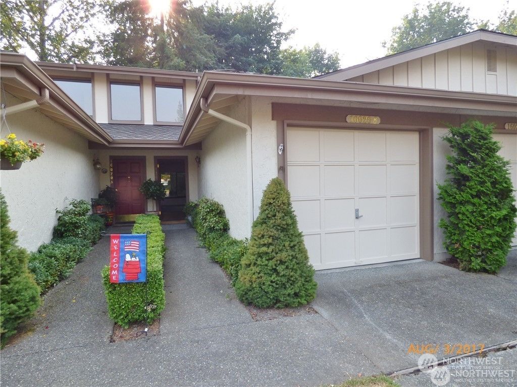 Photo of 16020 Village Green Drive #B, Mill Creek, WA 98012 (MLS # 2323994)