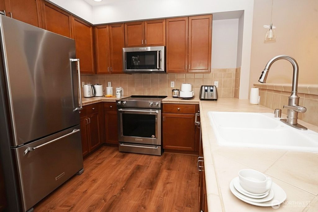 Photo of 11004 NE 11th Street #301, Bellevue, WA 98004 (MLS # 2431468)