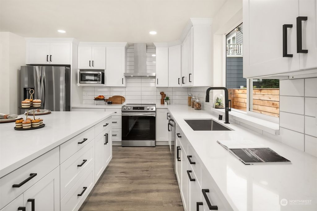 Photo of 4915 S Genesee Street, Seattle, WA 98118 (MLS # 2175004)