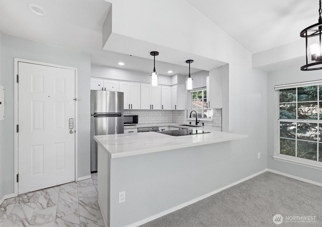 Photo of 2560 118th Avenue SE #3-301, Bellevue, WA 98005 (MLS # 2531192)