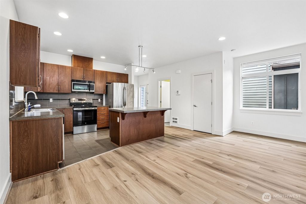 Photo of 8128 Wolcott Avenue S, Seattle, WA 98118 (MLS # 2524808)