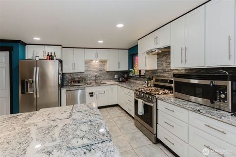 Photo of 12306 SW Champion Drive, Olympia, WA 98512 (MLS # 2457764)