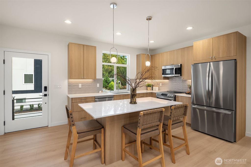 Photo of 10815 11th Avenue NE, Seattle, WA 98125 (MLS # 2476862)