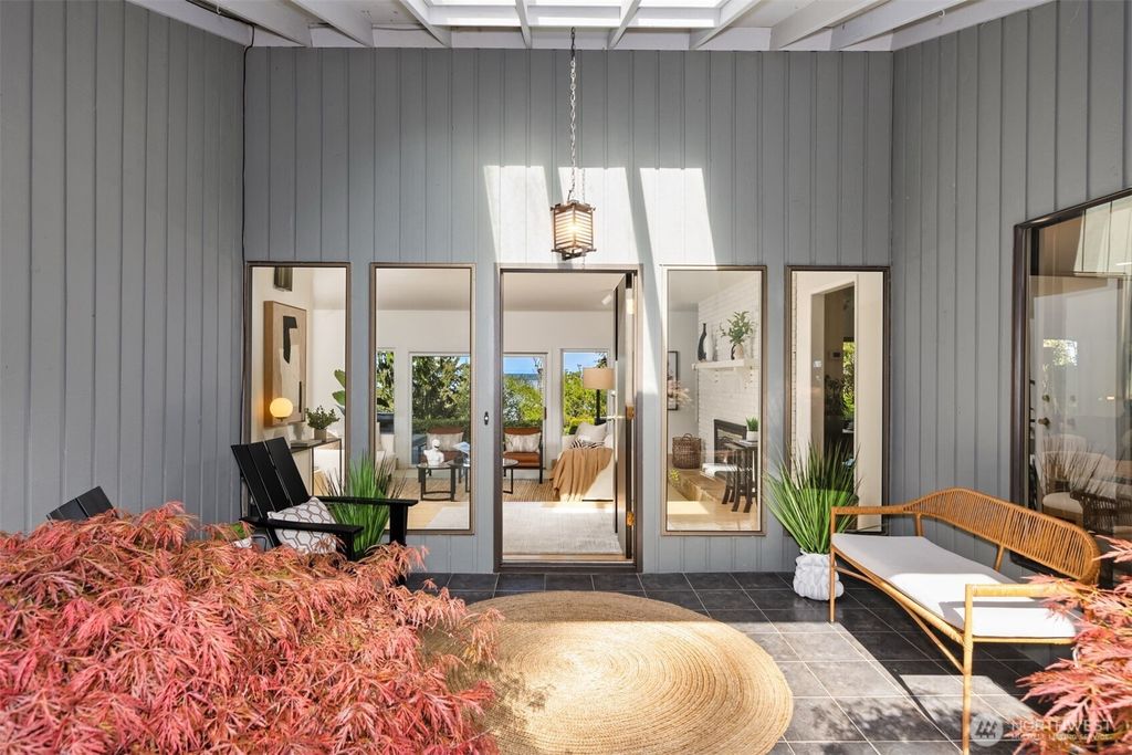 Photo of 10700 NE Broomgerrie Road, Bainbridge Island, WA 98110 (MLS # 2482359)