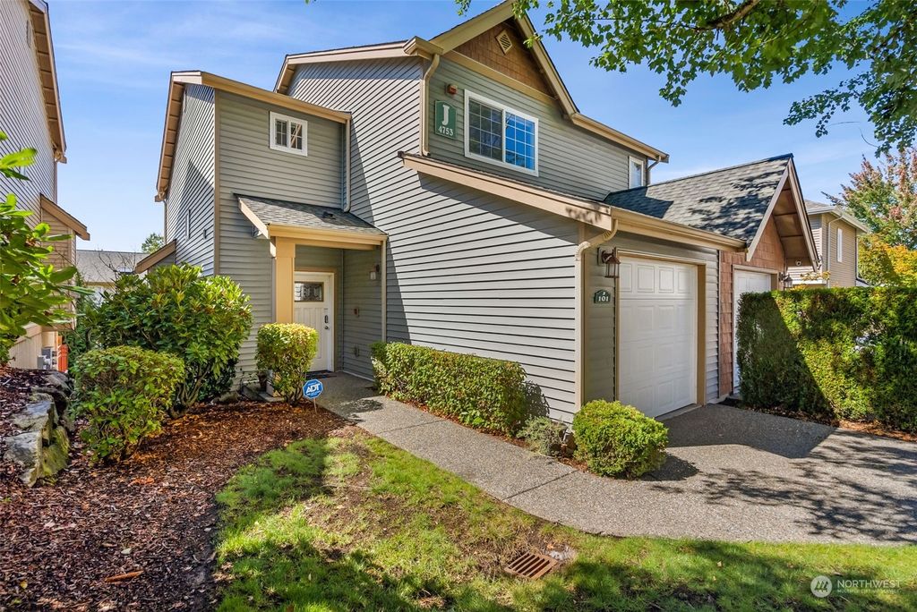 Photo of 4753 Whitworth Place SE #J101, Renton, WA 98055 (MLS # 2284929)