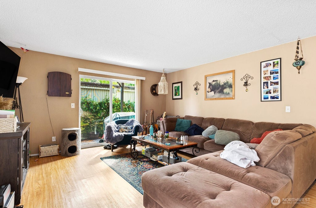 Photo of 8632 26th Avenue SW, Seattle, WA 98106 (MLS # 2573723)