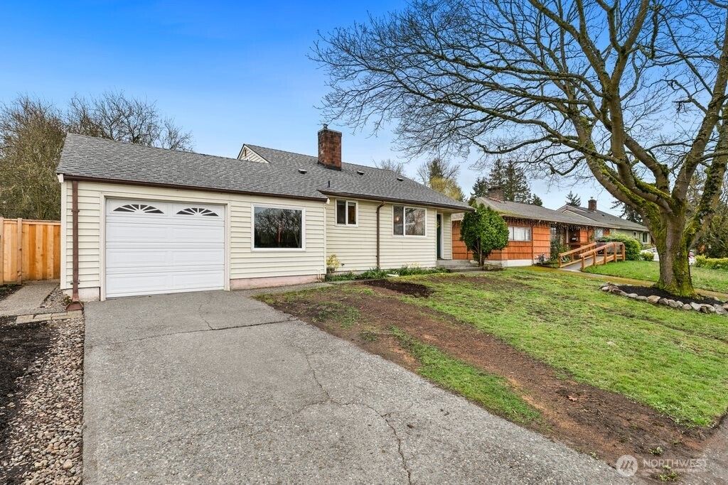 Photo of 9444 26th Avenue SW, Seattle, WA 98106 (MLS # 2489348)