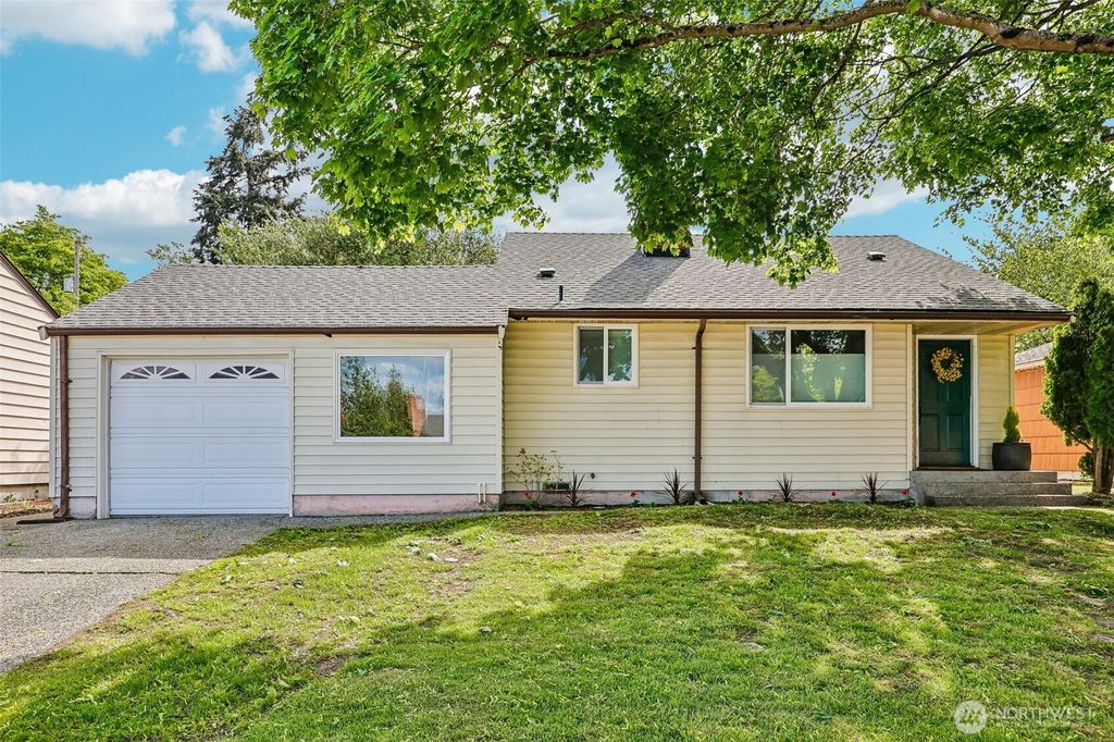 Photo of 9444 26th Avenue SW, Seattle, WA 98106 (MLS # 2489348)