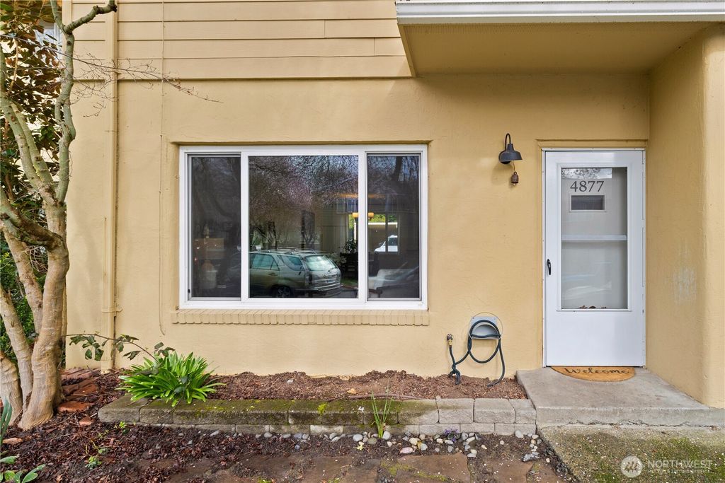 Photo of 4877 Terrace Drive NE, Seattle, WA 98105 (MLS # 2481608)