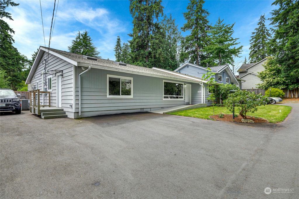 Photo of 13345 3rd Avenue NE, Seattle, WA 98125 (MLS # 2254253)