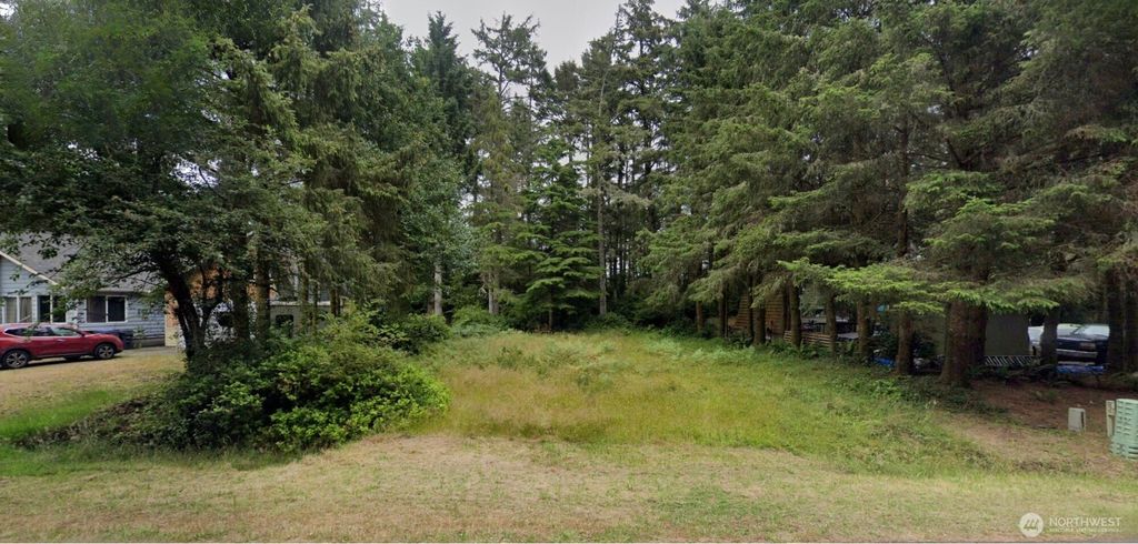 Photo of 750 Duck Lake Drive SE, Ocean Shores, WA 98569 (MLS # 2500037)