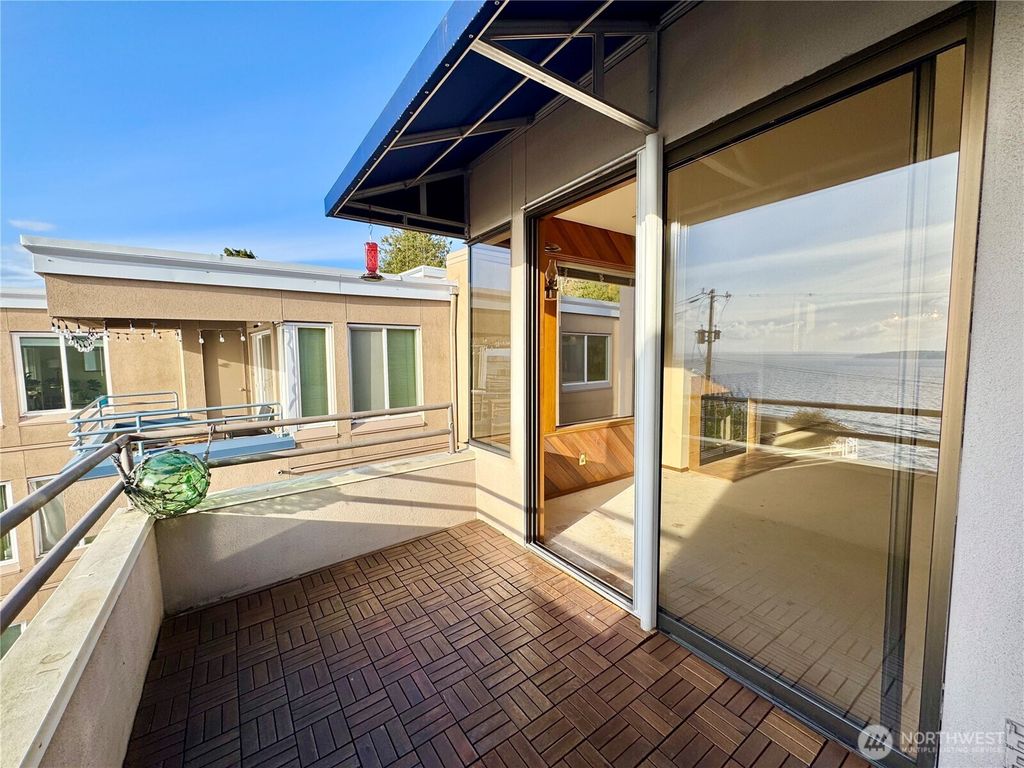 Photo of 4222 Beach Drive SW #401, Seattle, WA 98116 (MLS # 2453998)