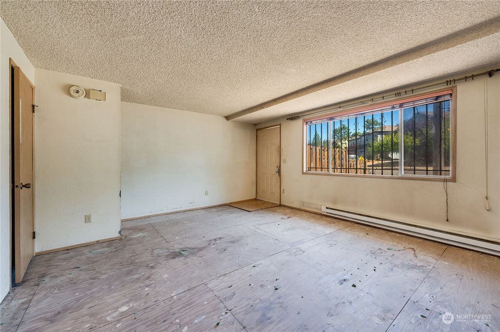 Photo of 8301 Wolcott Avenue S, Seattle, WA 98118 (MLS # 2270013)