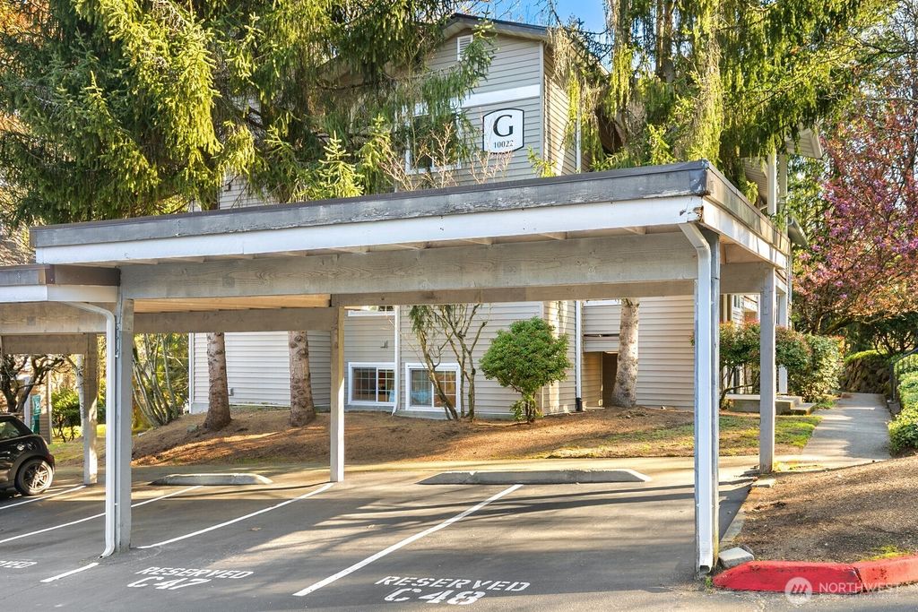 Photo of 10022 NE 120th Lane #G101, Kirkland, WA 98034 (MLS # 2505423)