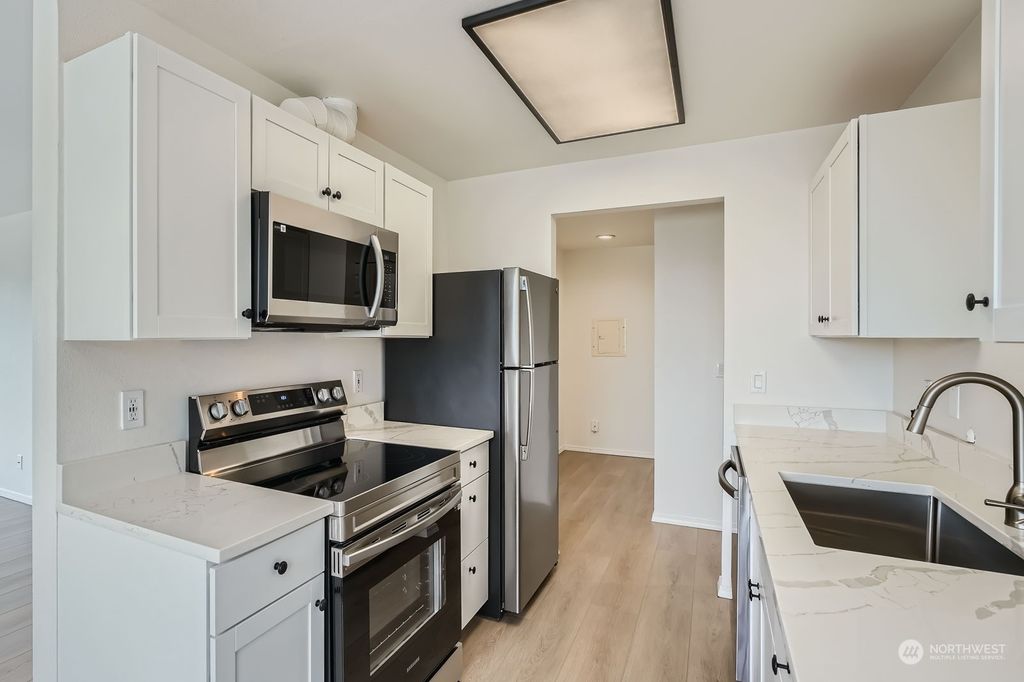 Photo of 1000 NE 88th Street #401, Seattle, WA 98115 (MLS # 2263808)