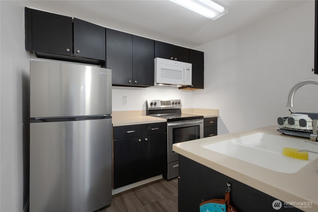 Photo of 11002 SE Petrovitsky Road #E103, Renton, WA 98055 (MLS # 2454155)