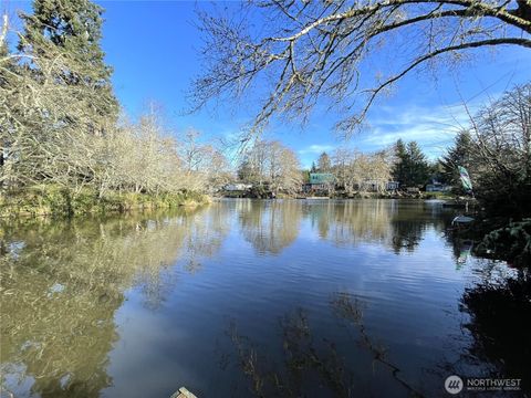 Photo of 824 Catala Avenue SE, Ocean Shores, WA 98569 (MLS # 2416642)