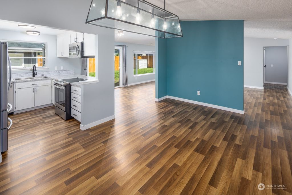 Photo of 11830 SE 261st Place, Kent, WA 98030 (MLS # 2237851)