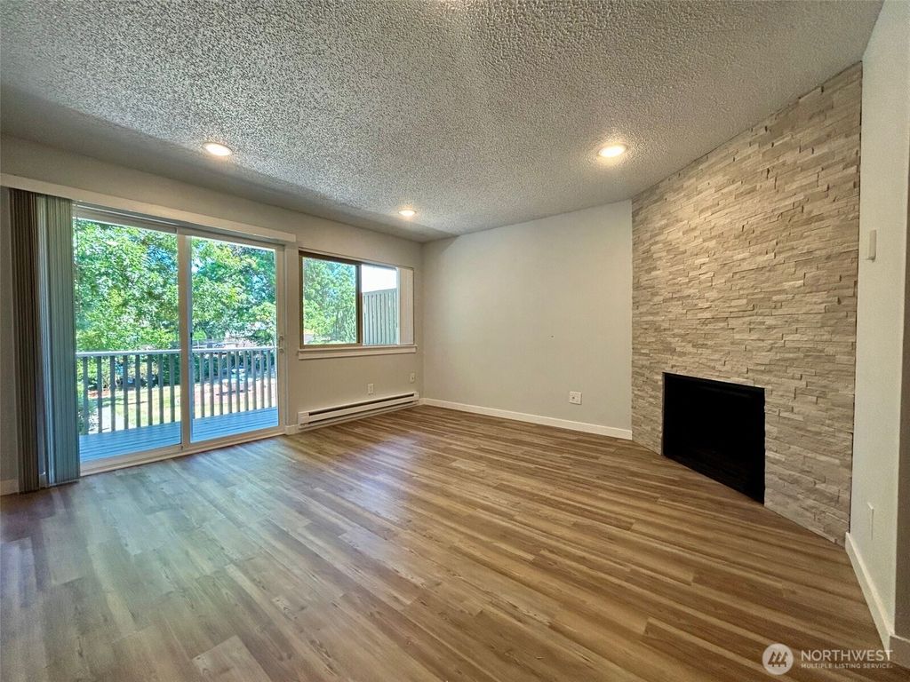 Photo of 9623 S 248 Street #D4, Kent, WA 98030 (MLS # 2402220)