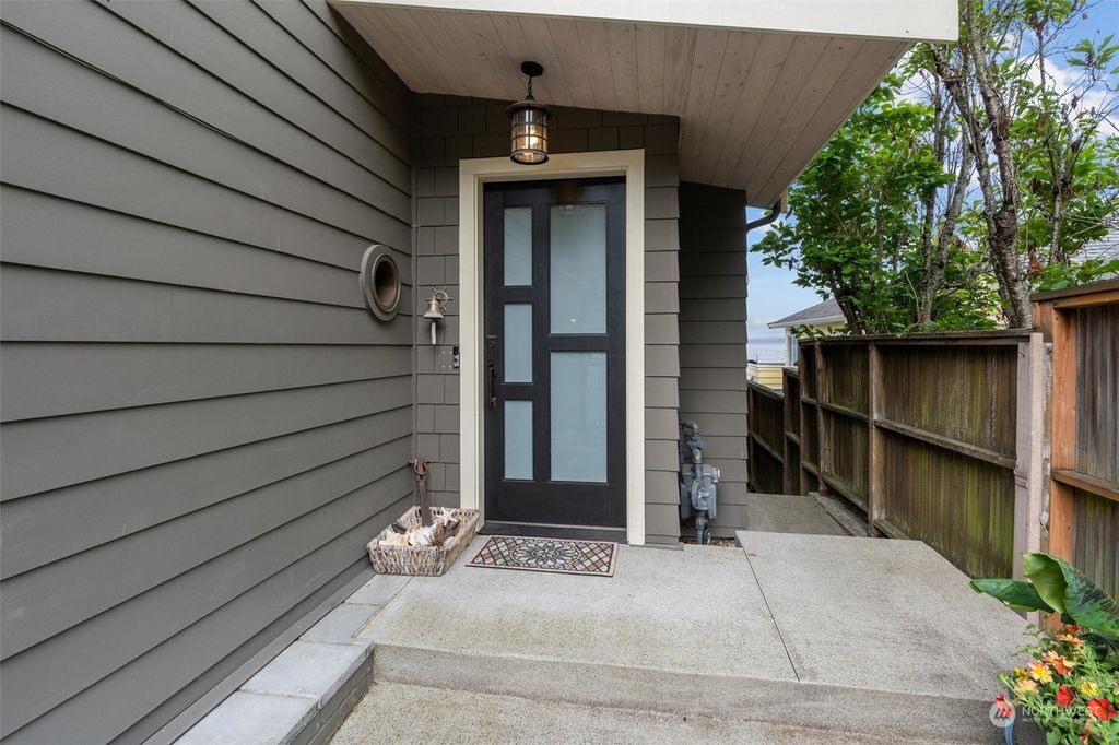 Photo of 5049 Beach Drive SW, Seattle, WA 98136 (MLS # 2127327)