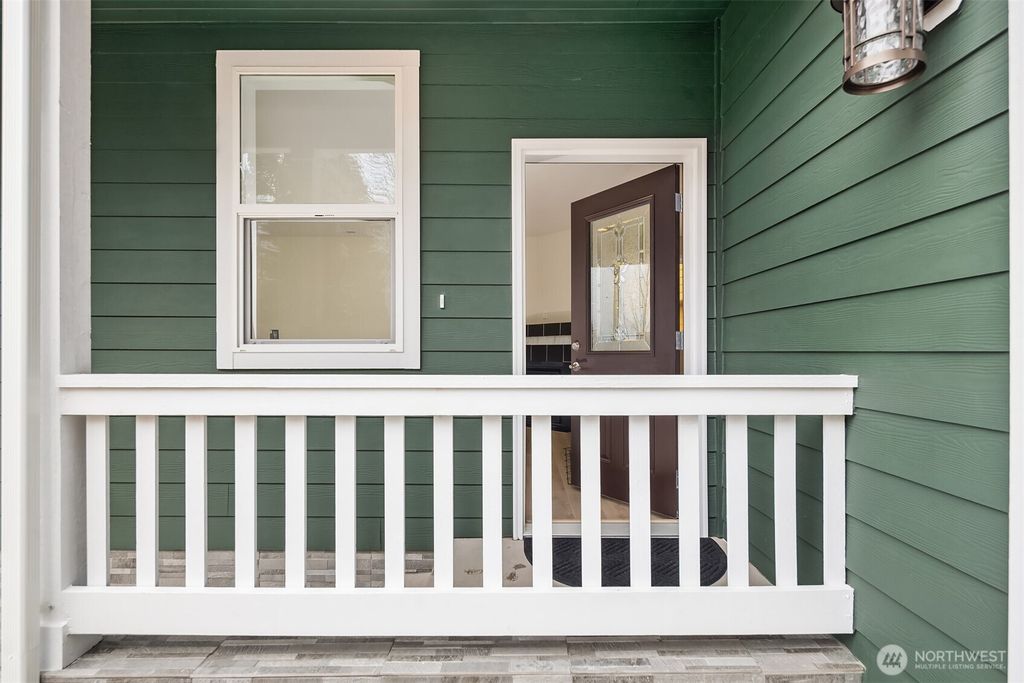 Photo of 2117 SW 103rd Place, Seattle, WA 98146 (MLS # 2436490)