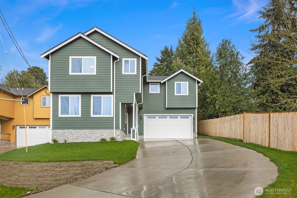 Photo of 2117 SW 103rd Place, Seattle, WA 98146 (MLS # 2436490)