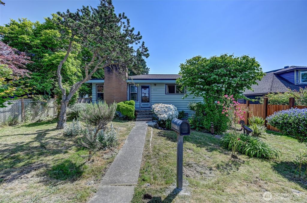Photo of 9216 36th Avenue SW, Seattle, WA 98126 (MLS # 2383047)