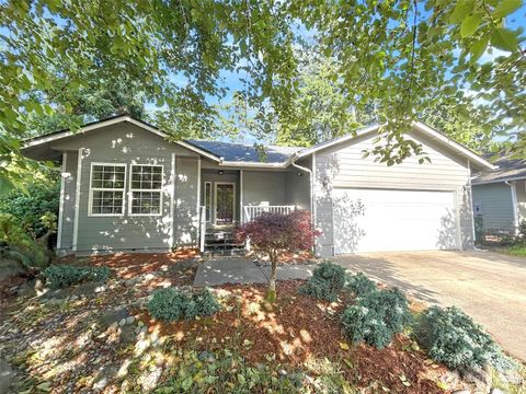 Photo of 618 Woodland Loop NE, Ocean Shores, WA 98569 (MLS # 2422112)