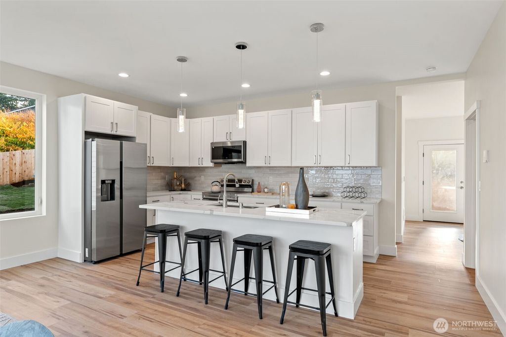 Photo of 8618 37th Avenue S, Seattle, WA 98118 (MLS # 2387403)