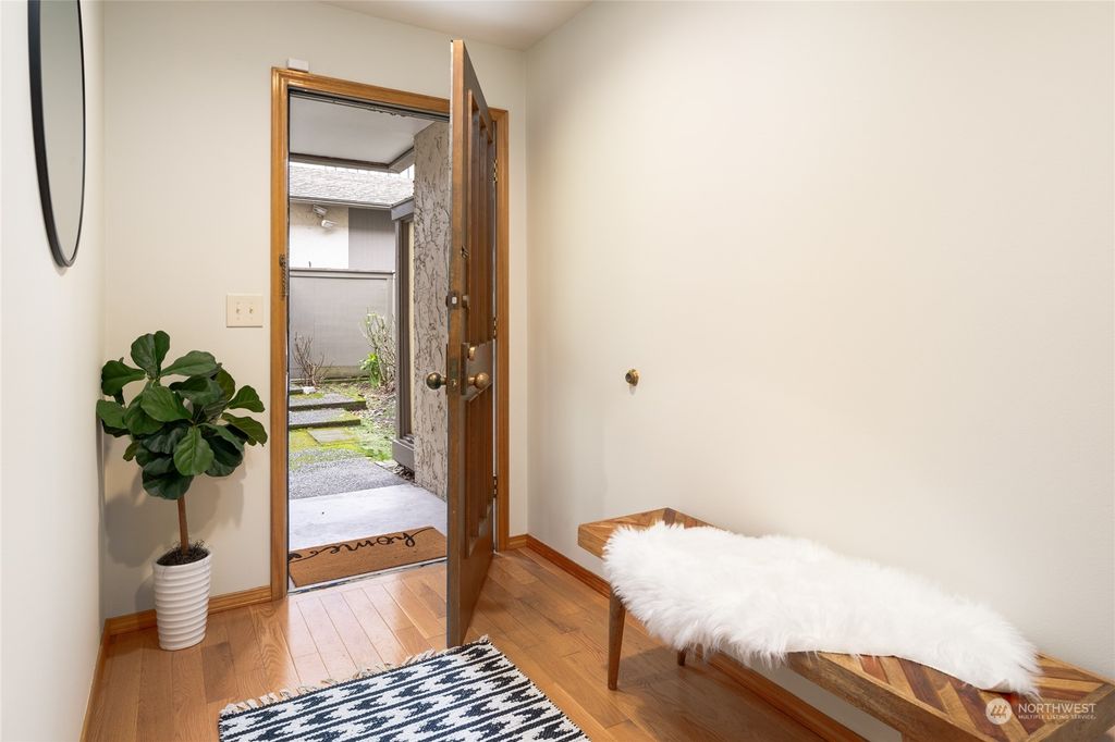 Photo of 6502 Park Point Way NE #B101, Seattle, WA 98115 (MLS # 2189721)