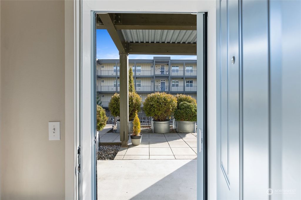 Photo of 7104 265th Street NW #204, Stanwood, WA 98292 (MLS # 2040063)