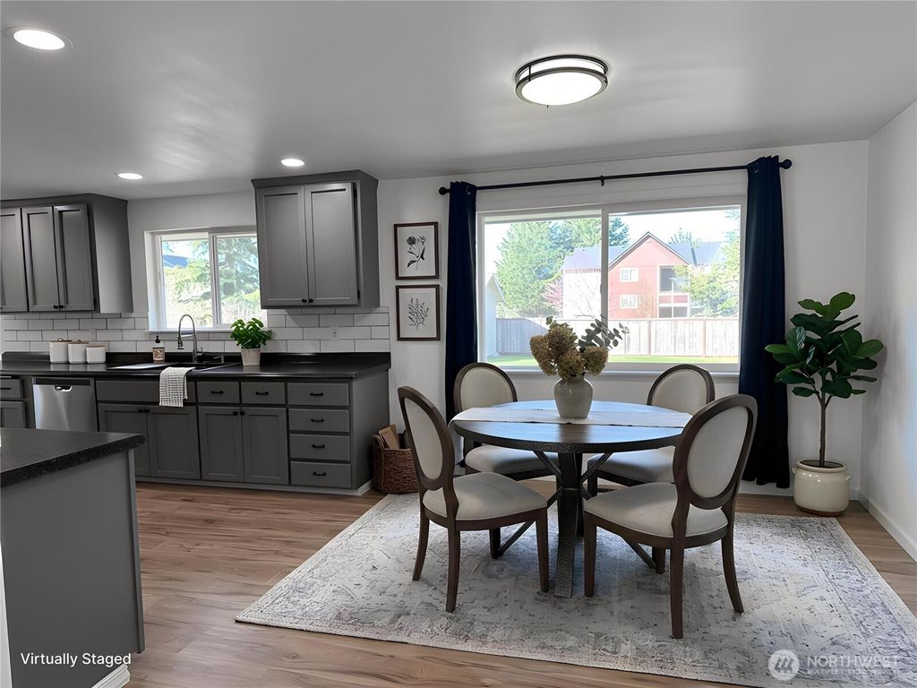 Photo of 11220 SE 212th Street, Kent, WA 98031 (MLS # 2499396)