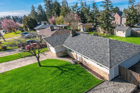 Photo of 11220 SE 212th Street, Kent, WA 98031 (MLS # 2499396)