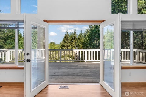 Photo of 110 E Glacier Crest Road, Grapeview, WA 98546 (MLS # 2529984)