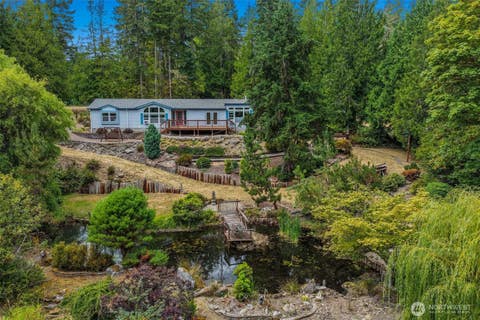 Photo of 731 NE Bear Creek Dewatto Road, Belfair, WA 98528 (MLS # 2569393)