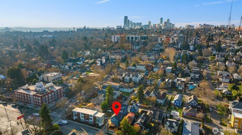 Photo of 1409 Martin Luther King Jr Way, Seattle, WA 98122 (MLS # 2498063)