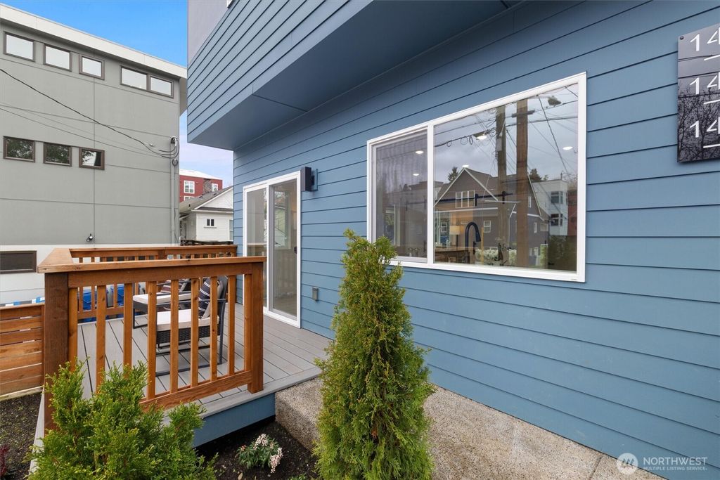 Photo of 1409 Martin Luther King Jr Way, Seattle, WA 98122 (MLS # 2498063)