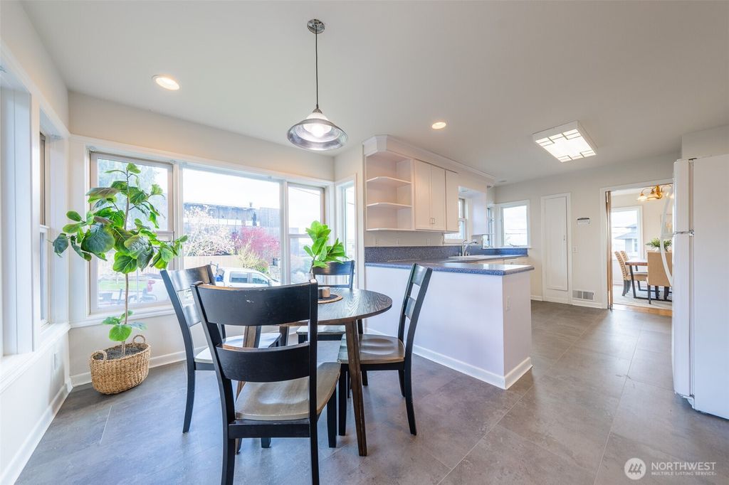 Photo of 3201 36th Avenue SW, Seattle, WA 98126 (MLS # 2357611)