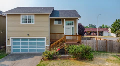 Photo of 1002 E 71st Street Ct, Tacoma, WA 98404 (MLS # 2564583)