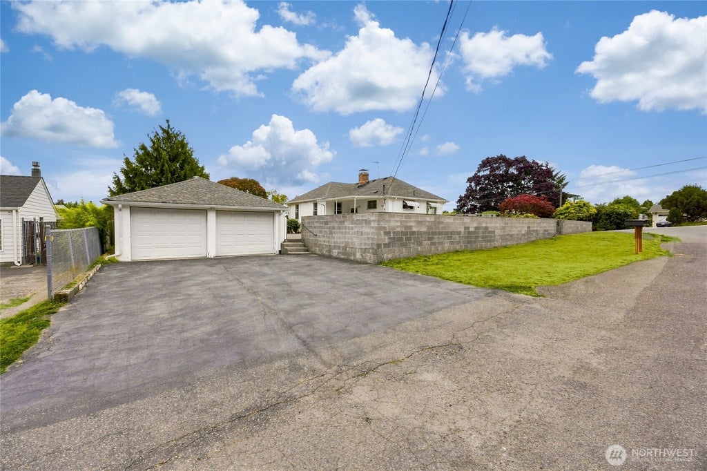 Photo of 15852 7th Avenue SW, Seattle, WA 98166 (MLS # 2573015)