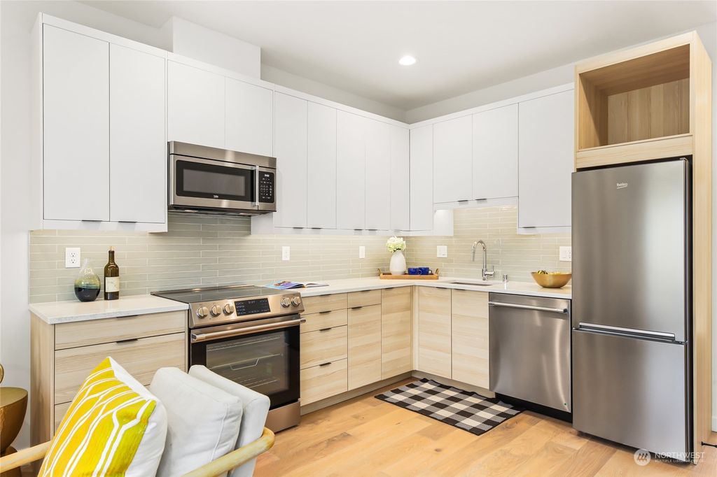 Photo of 8334 26th Avenue NW #B, Seattle, WA 98117 (MLS # 2319089)