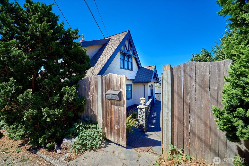 Photo of 5610 SW Teig Place, Seattle, WA 98116 (MLS # 2425573)