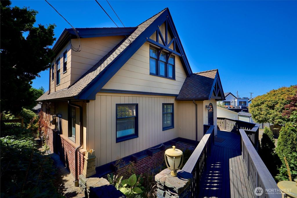 Photo of 5610 SW Teig Place, Seattle, WA 98116 (MLS # 2425573)