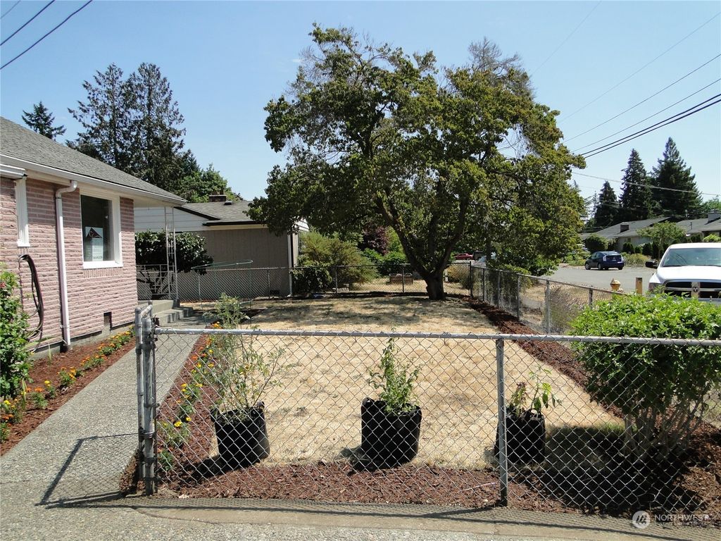 Photo of 2328 NE 128th Street, Seattle, WA 98125 (MLS # 2141792)