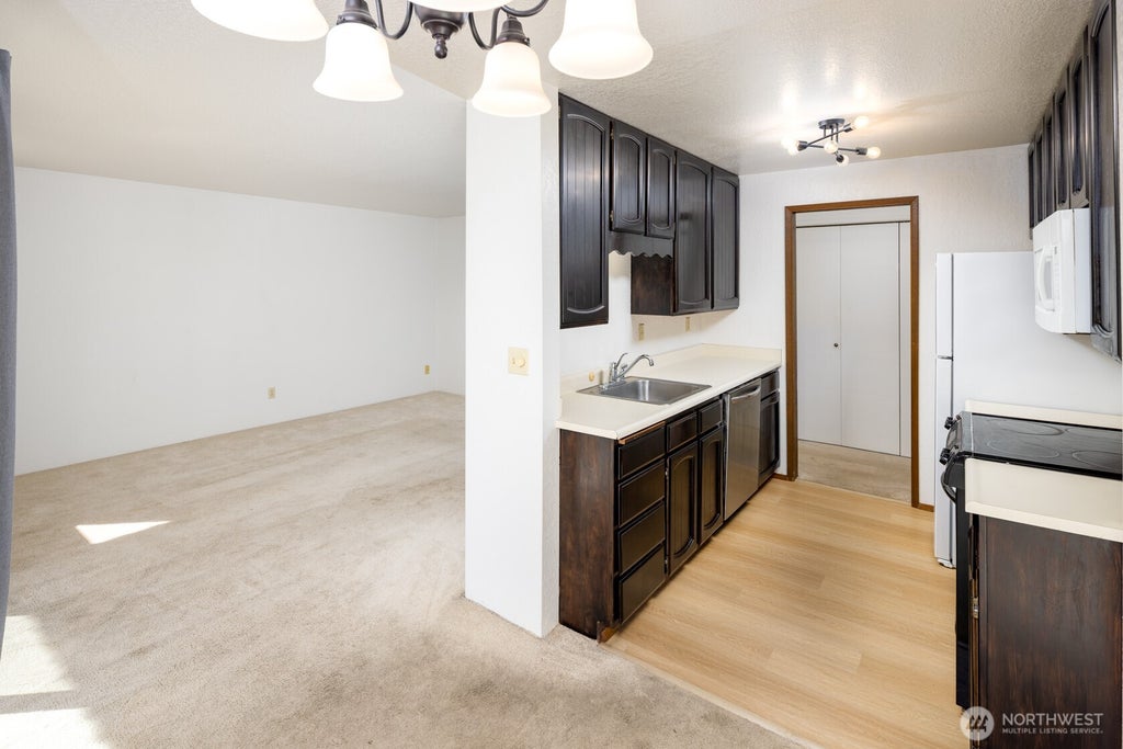 Photo of 12035 32nd Avenue NE #304, Seattle, WA 98125 (MLS # 2581171)