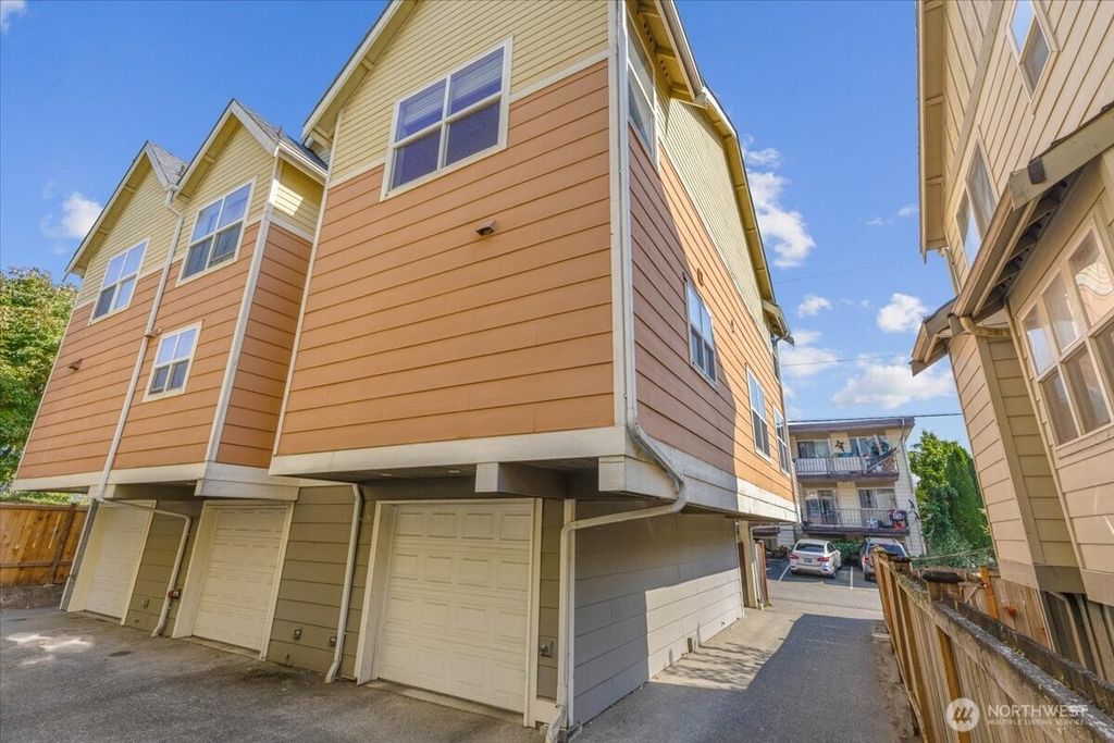 Photo of 1719 SW Henderson Street, Seattle, WA 98106 (MLS # 2504388)