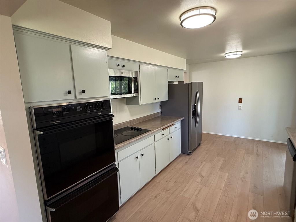 Photo of 1809 Blaine Avenue NE, Renton, WA 98056 (MLS # 2410545)