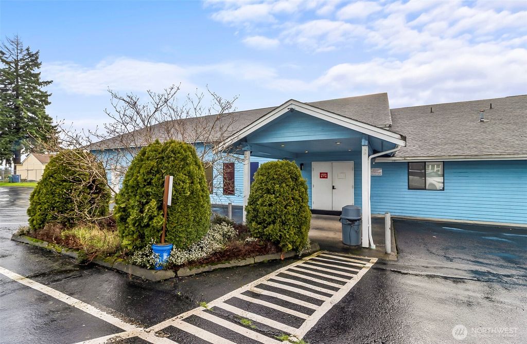 Photo of 7550 Martin Luther King Jr Way S, Seattle, WA 98118 (MLS # 2467910)